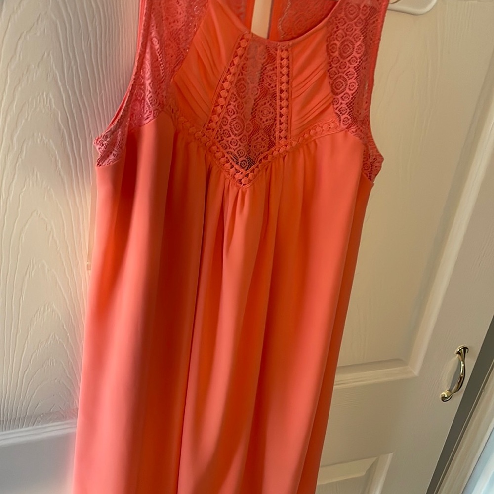 Peachy colored dress